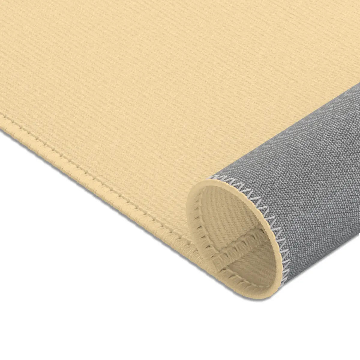 Kinderteppich "Lino Dino" von spielzwerg. Nahaufnahme gerollt. RUG-00110-XL, RUG-00110-L.