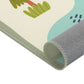 Spielteppich "Wanderurlaub" von spielzwerg. Nahaufnahme gerollt. RUG-00107-XL, RUG-00107-L.