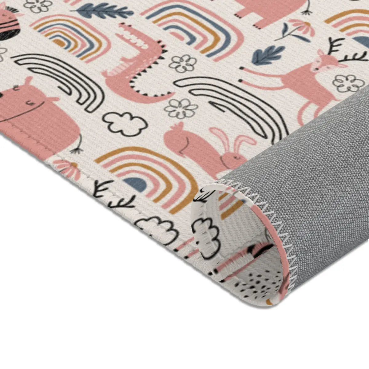 Kinderteppich "Wilde Safari" von spielzwerg. Nahaufnahme gerollt. RUG-00133-XL, RUG-00133-L.