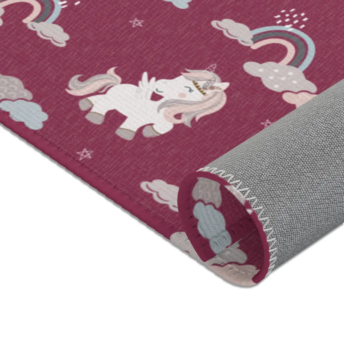 Kinderteppich "Einhornchaos" von spielzwerg. Nahaufnahme gerollt. RUG-00120-XL, RUG-00120-L.