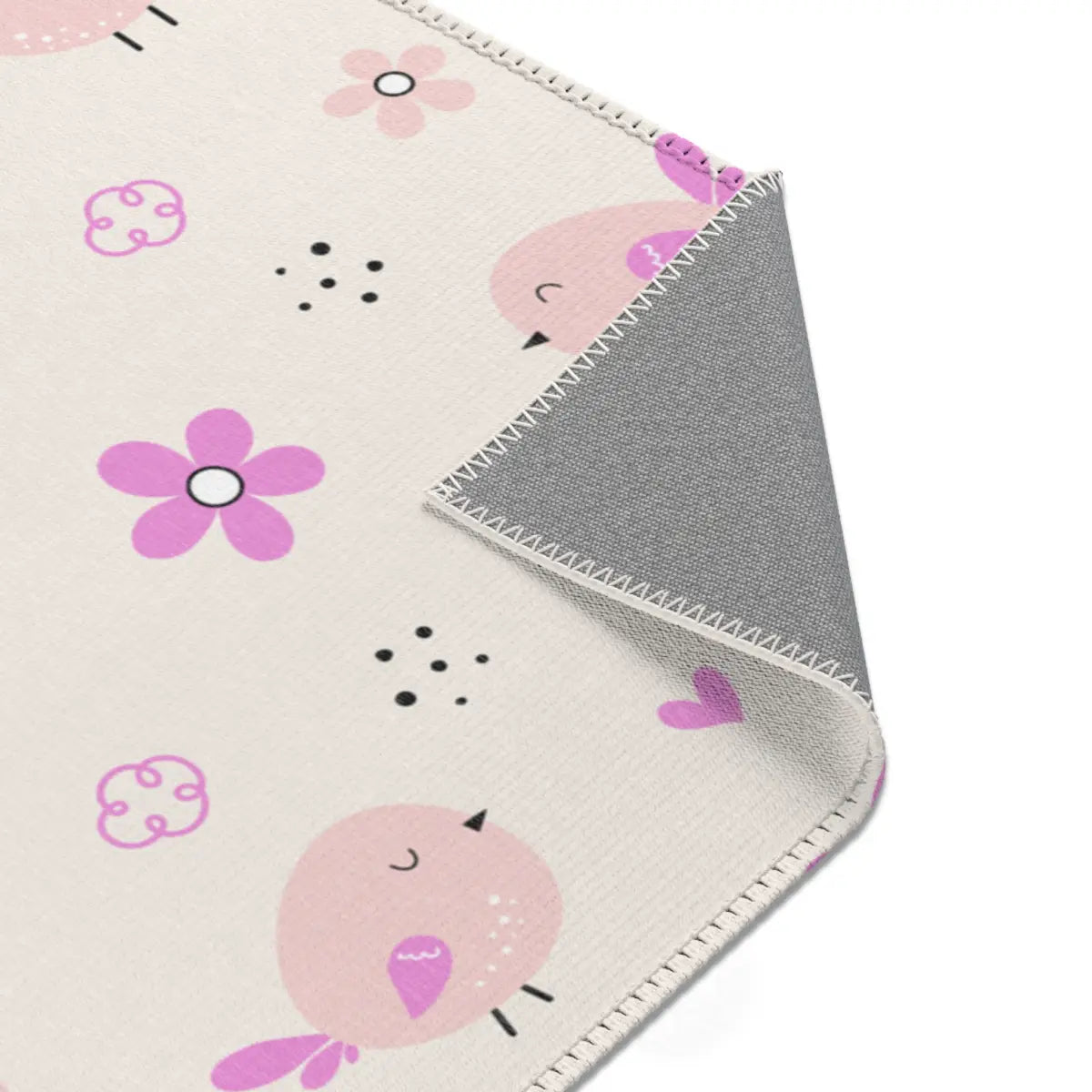 Kinderteppich "Vogelgesang" von spielzwerg. Nahaufnahme umgeklappte Ecke. RUG-00065-XL, RUG-00065-L.