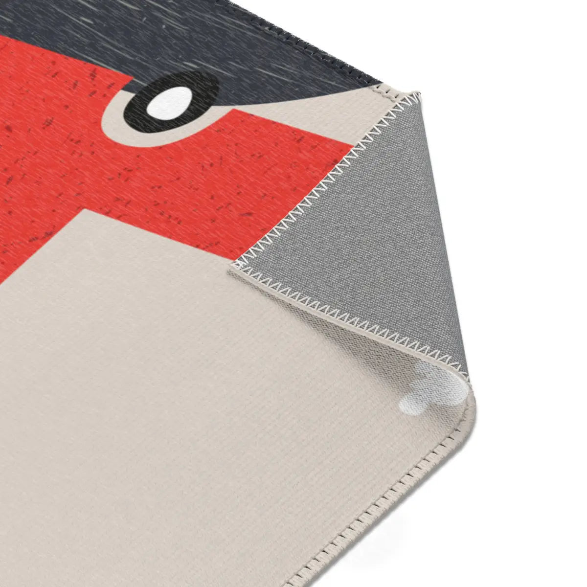 Kinderteppich "Dino im Auto" von spielzwerg. Nahaufnahme umgeklappte Ecke. RUG-00030-XL, RUG-00030-L.
