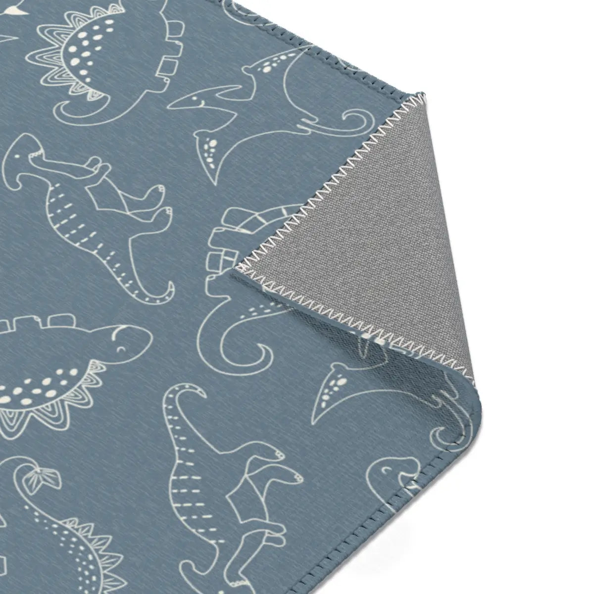 Kinderteppich "Kreidezeit" von spielzwerg. Nahaufnahme umgeklappte Ecke. RUG-00028-XL, RUG-00028-L.