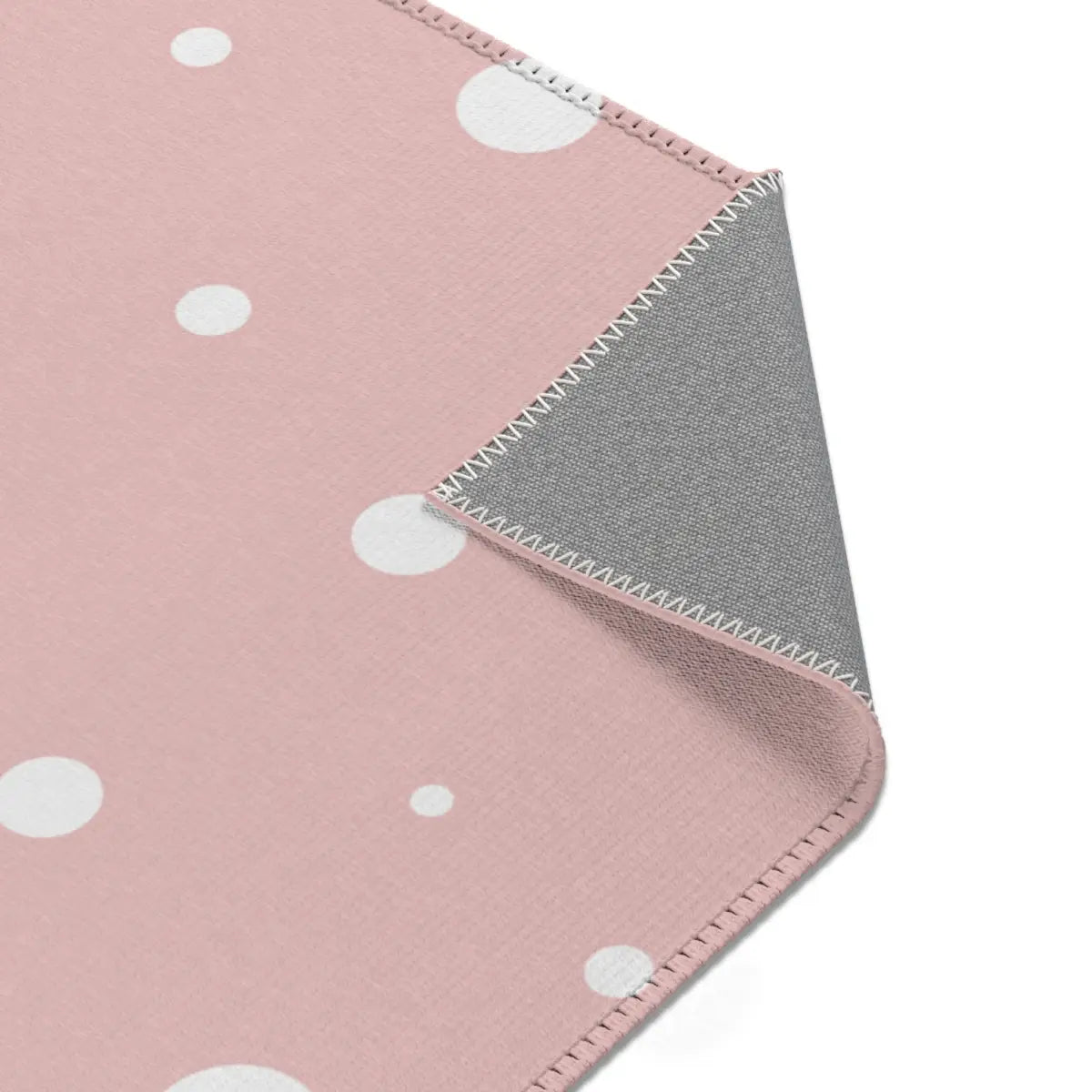 Kinderteppich "Weiße Punkte" von spielzwerg. Nahaufnahme umgeklappte Ecke. RUG-00172-XL, RUG-00172-L.
