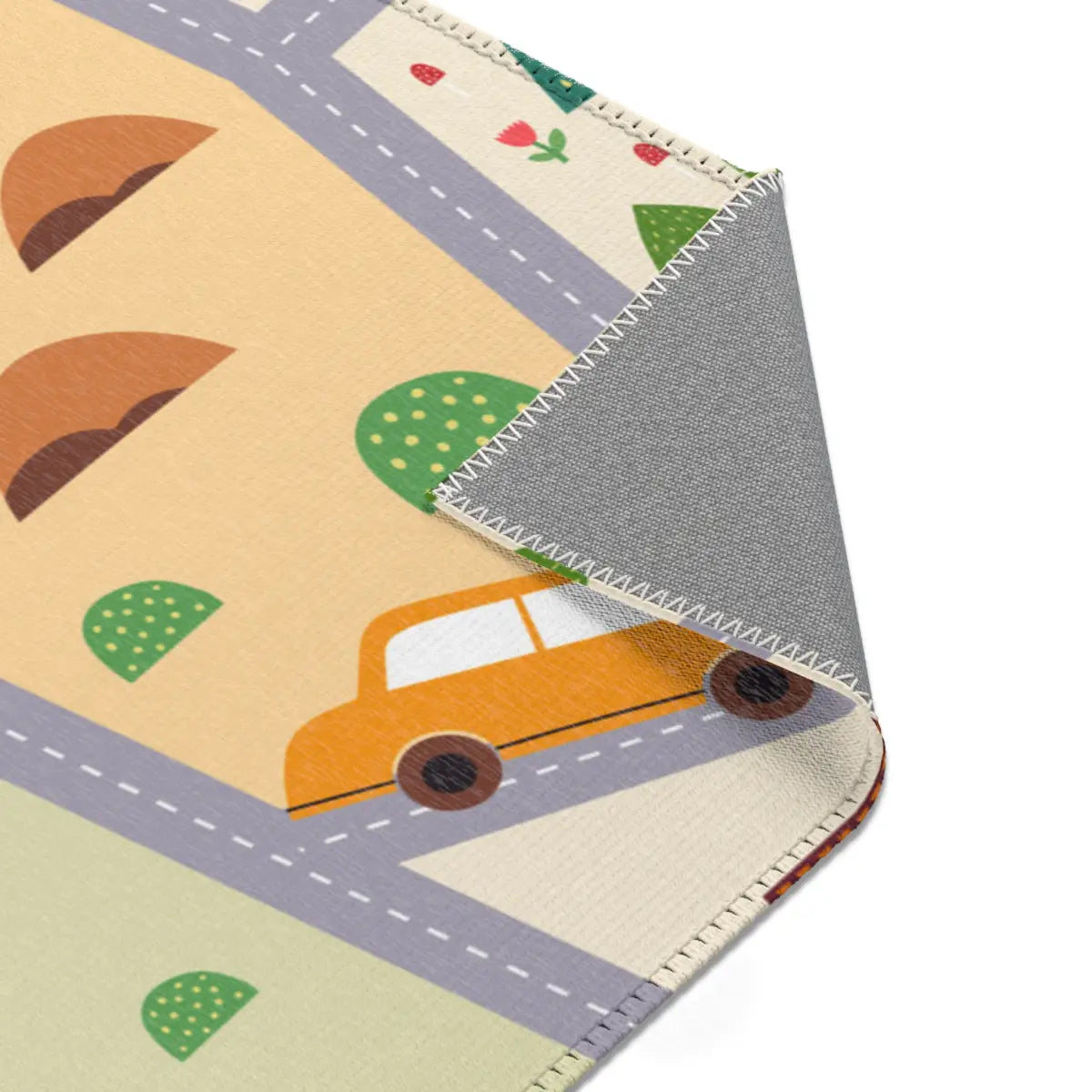 Spielteppich "Mosaik-Dorf" von spielzwerg. Nahaufnahme umgeklappte Ecke. RUG-00187-XL, RUG-00187-L.