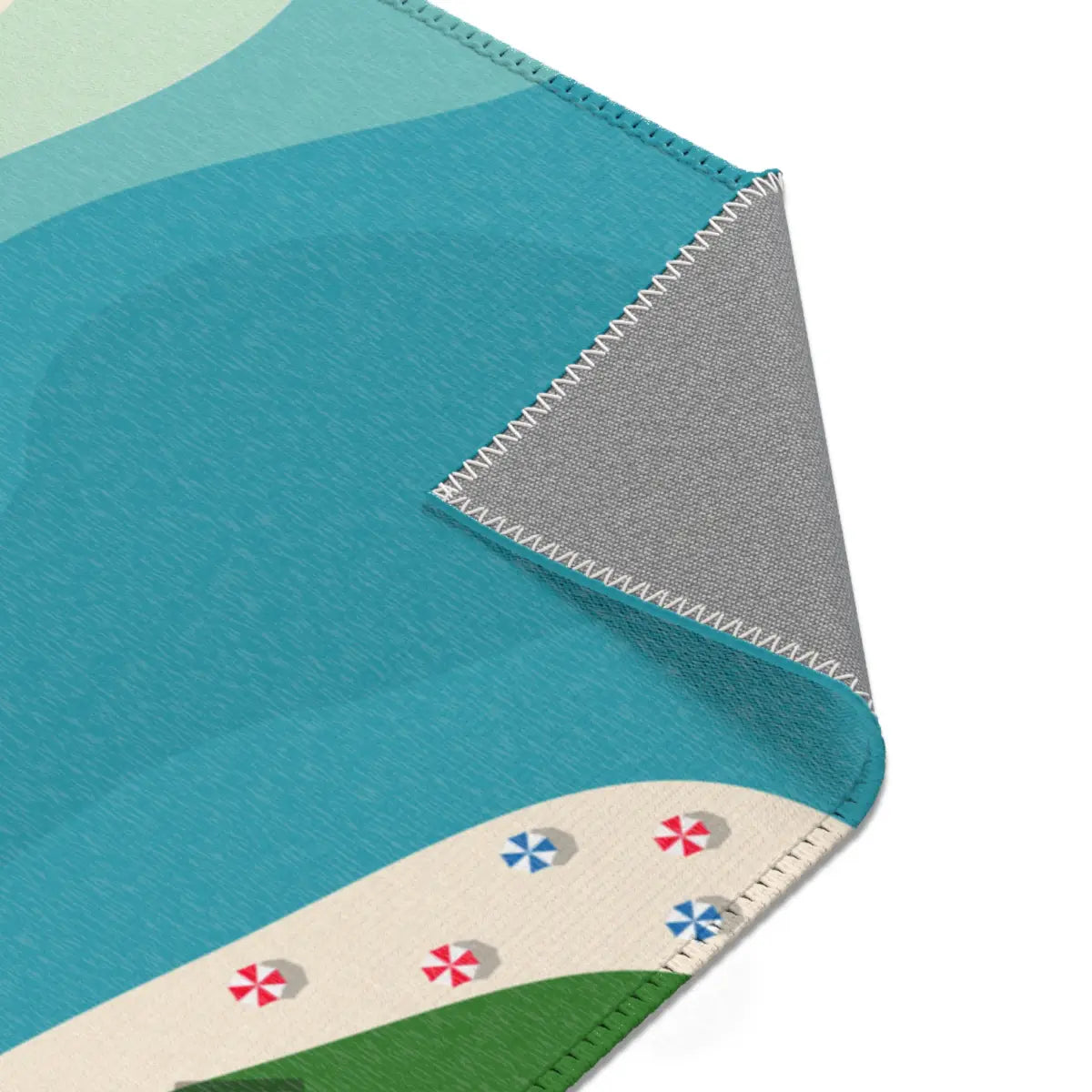Spielteppich "Stadt am Meer" von spielzwerg. Nahaufnahme umgeklappte Ecke. RUG-00040-XL, RUG-00040-L.