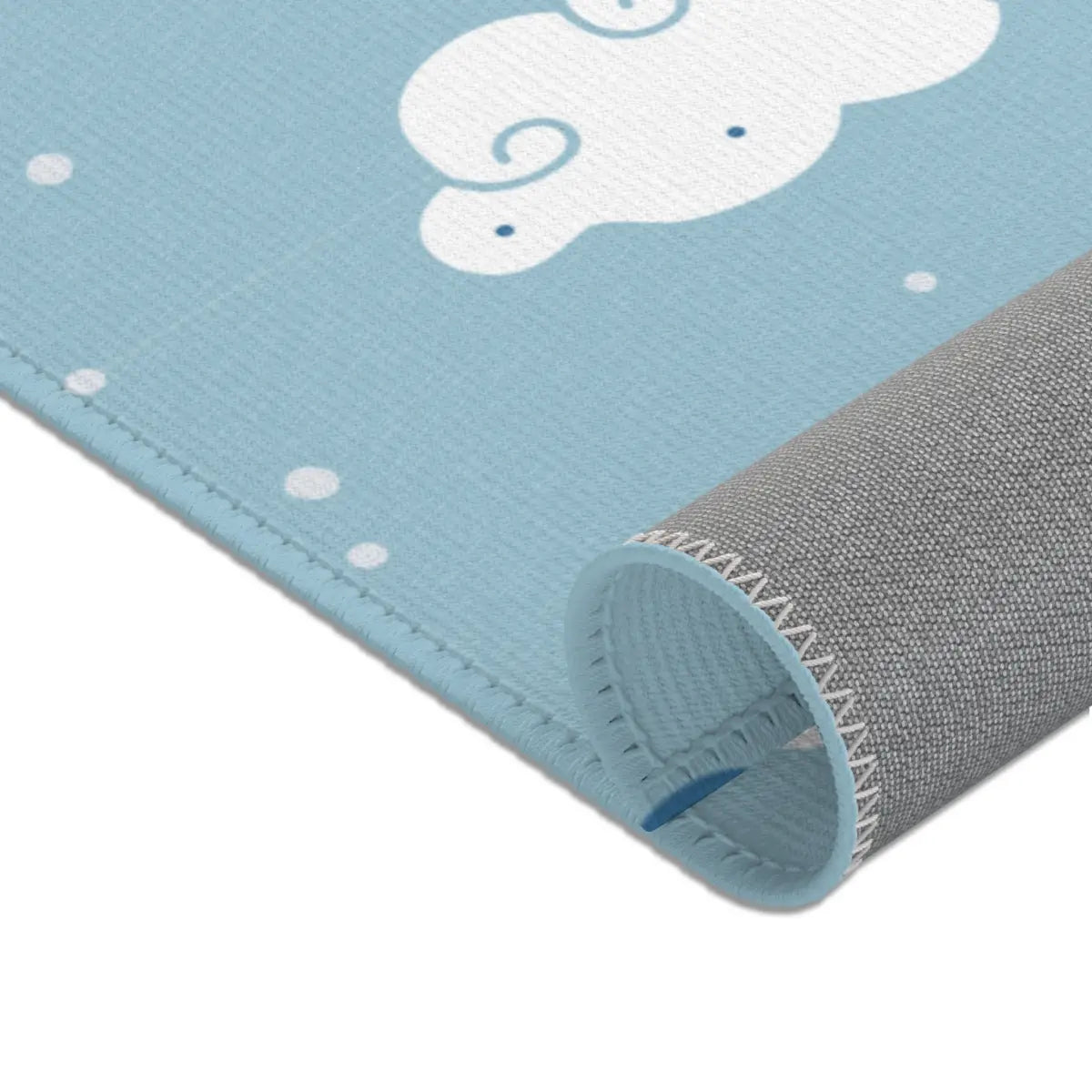 Kinderteppich "Wolkendecke" von spielzwerg. Nahaufnahme gerollt. RUG-00045-XL, RUG-00045-L.