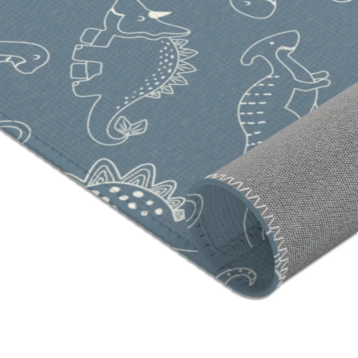 Kinderteppich "Kreidezeit" von spielzwerg. Nahaufnahme gerollt. RUG-00028-XL, RUG-00028-L.