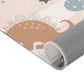 Kinderteppich "Dinos im Weltall" von spielzwerg. Nahaufnahme gerollt. RUG-00043-XL, RUG-00043-L.