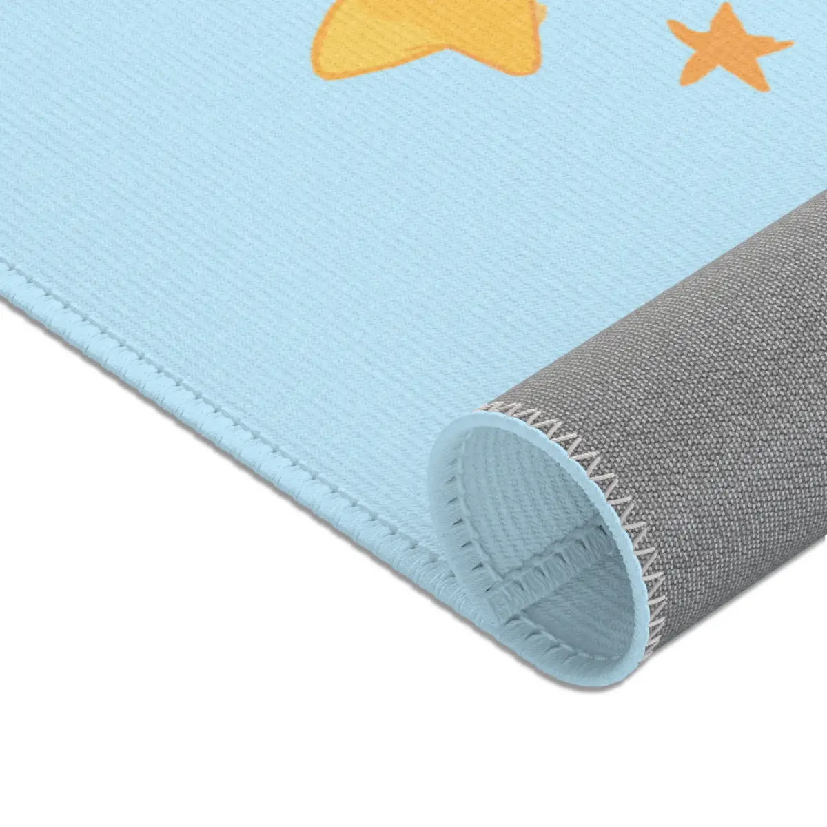 Kinderteppich "Unsere Erde" von spielzwerg. Nahaufnahme gerollt. RUG-00169-XL, RUG-00169-L.