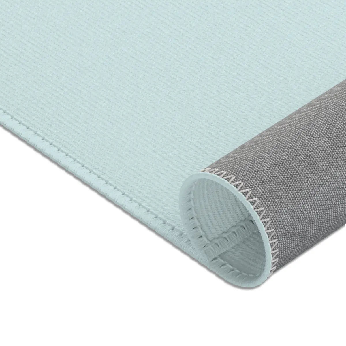 Kinderteppich "Ari" von spielzwerg. Nahaufnahme gerollt. RUG-00056-XL, RUG-00056-L.
