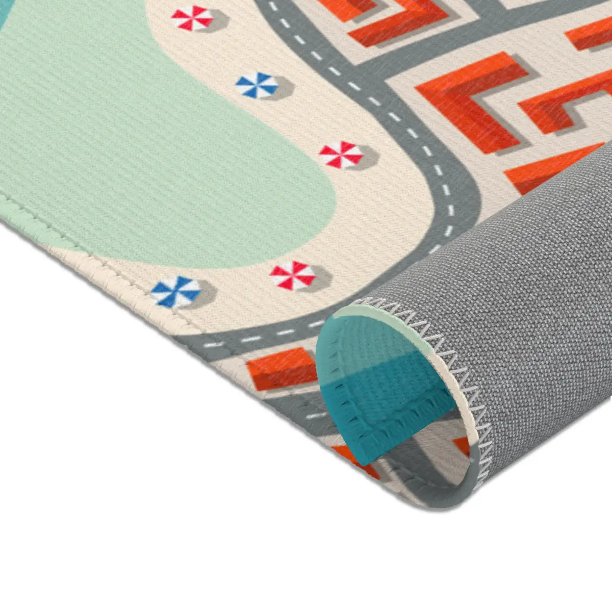 Spielteppich "Stadt am Meer" von spielzwerg. Nahaufnahme gerollt. RUG-00040-XL, RUG-00040-L.
