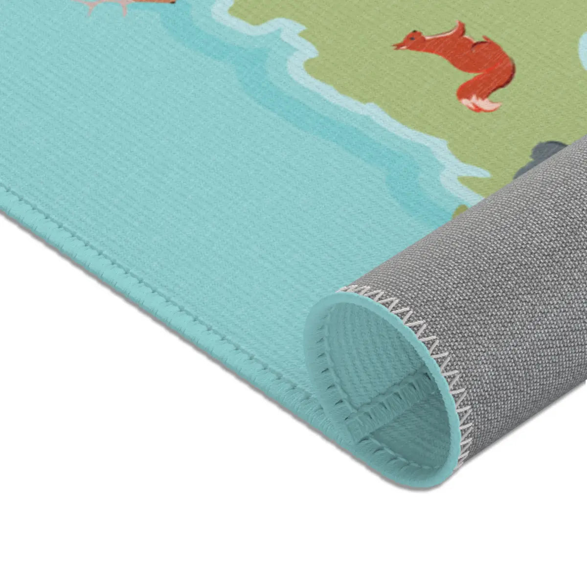 Spielteppich "Tiere der Welt" von spielzwerg. Nahaufnahme gerollt. RUG-00177-XL, RUG-00177-L.