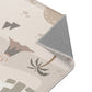Kinderteppich "Dino-Landschaft" von spielzwerg. Nahaufnahme umgeklappte Ecke. RUG-00092-XL, RUG-00092-L.