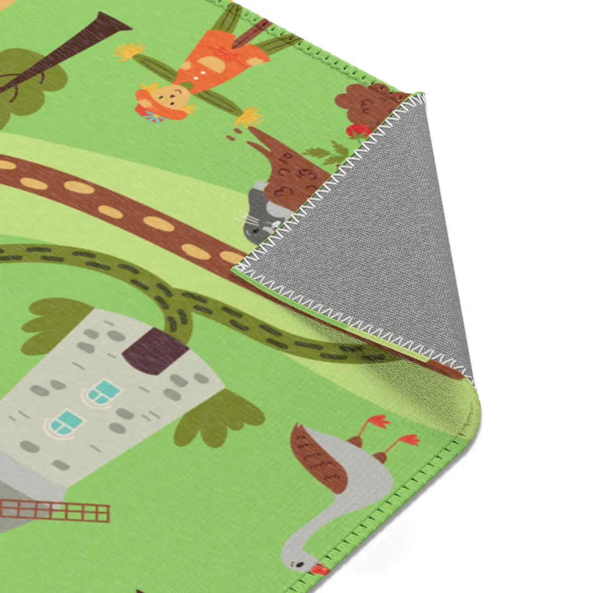 Spielteppich "Marias Farm" von spielzwerg. Nahaufnahme umgeklappte Ecke. RUG-00091-XL, RUG-00091-L.