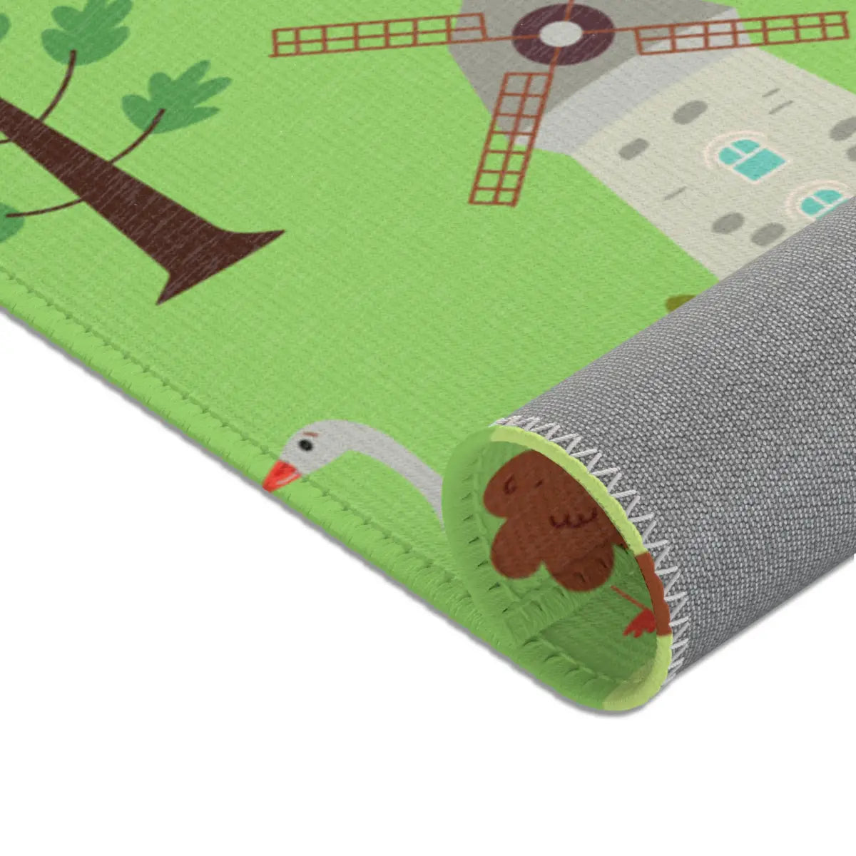 Spielteppich "Marias Farm" von spielzwerg. Nahaufnahme gerollt. RUG-00091-XL, RUG-00091-L.