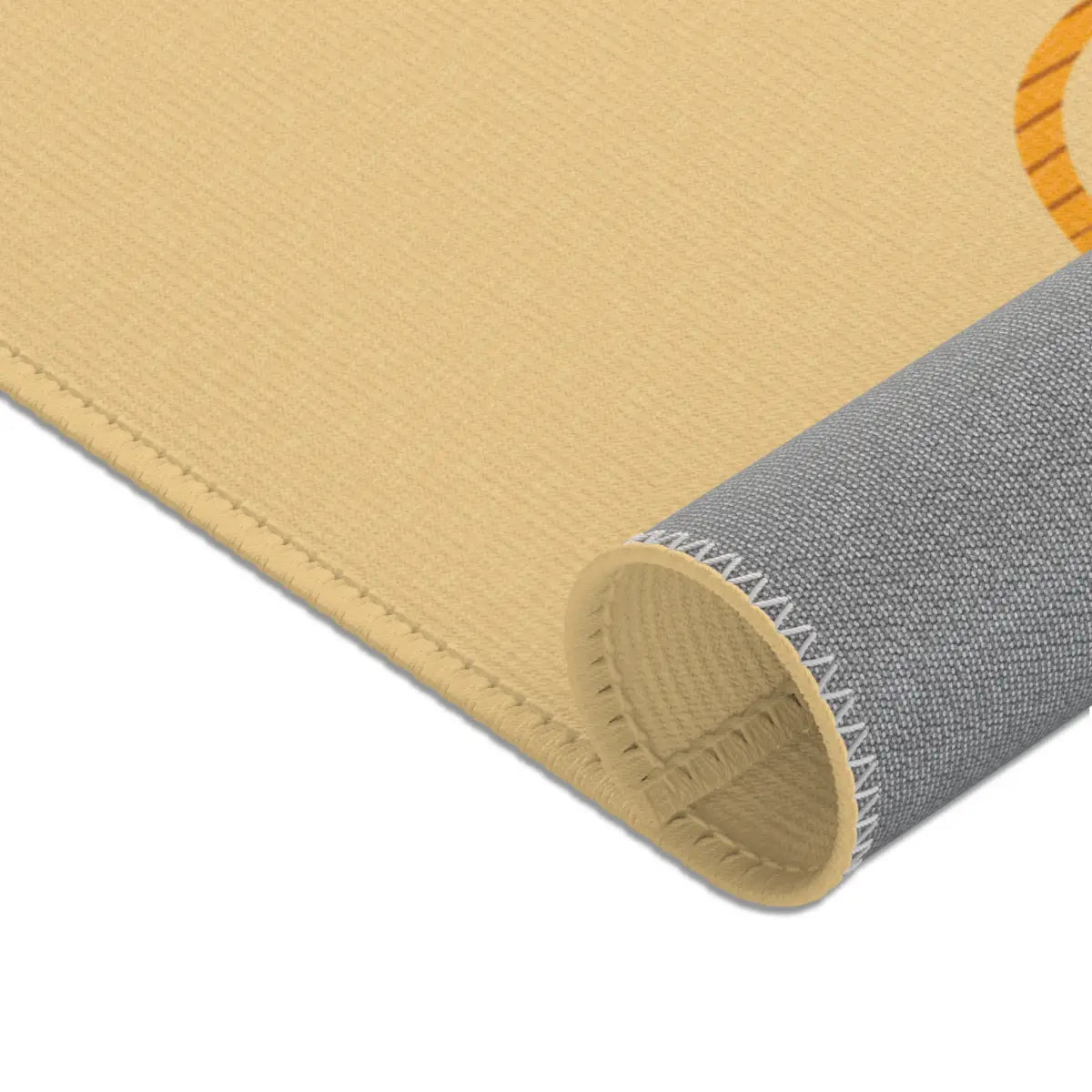 Kinderteppich "Mufasa" von spielzwerg. Nahaufnahme gerollt. RUG-00094-XL, RUG-00094-L.
